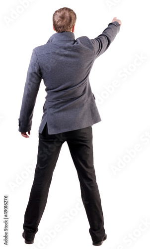 Back view of pointing business man