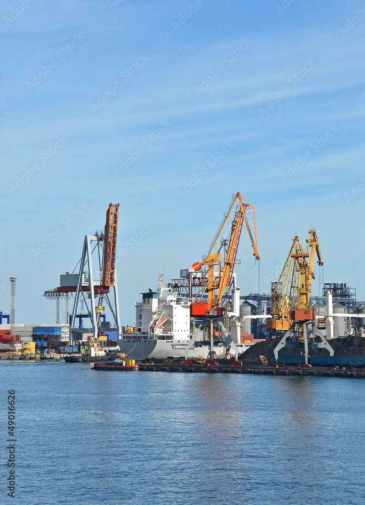 Cargo crane, ship, freight traine and coal in port