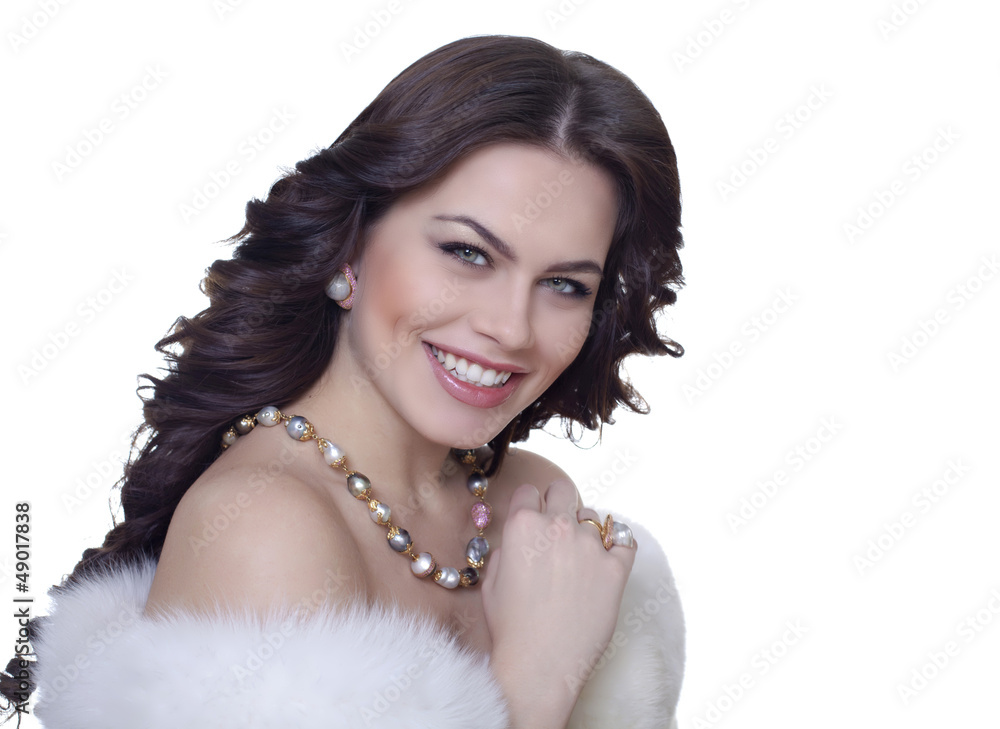Portrait of attractive brunette in a fur coat Portrait of attractive brunette in a fur coat