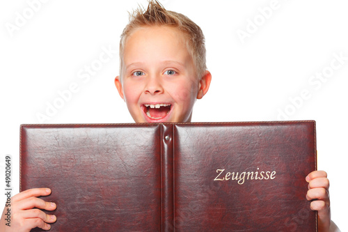 schoolboy proud of his school certificate photo