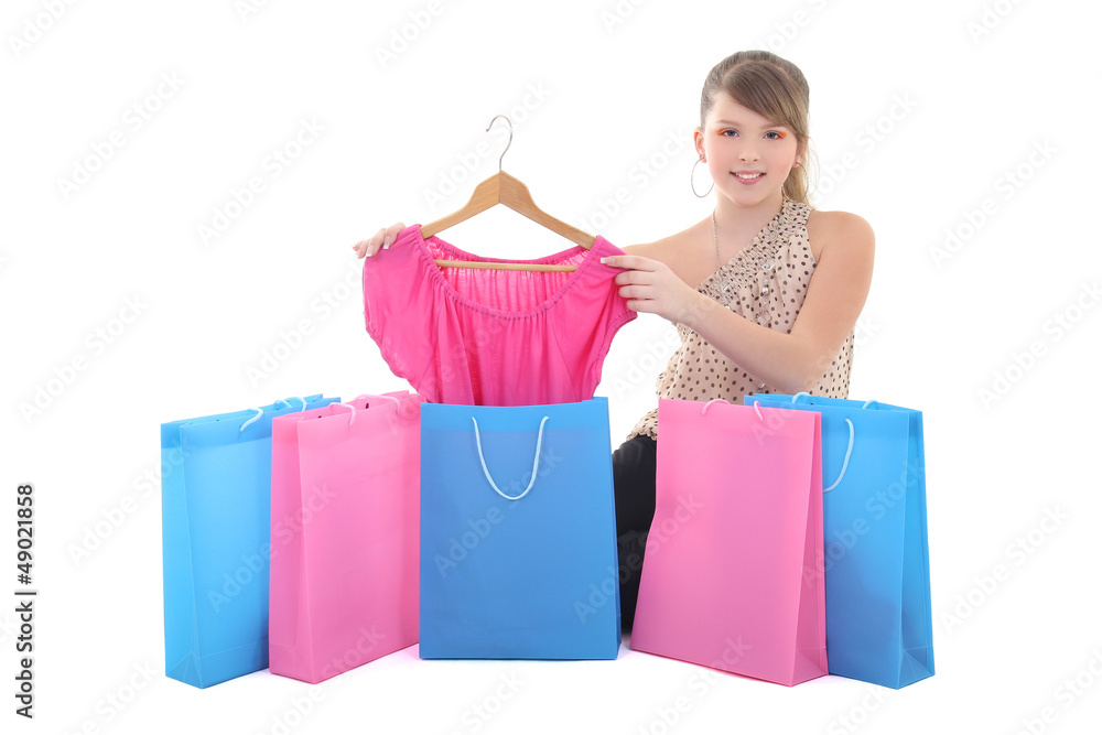 teenage girl showing new dress with shopping bags teenage girl showing new dress with shopping bags