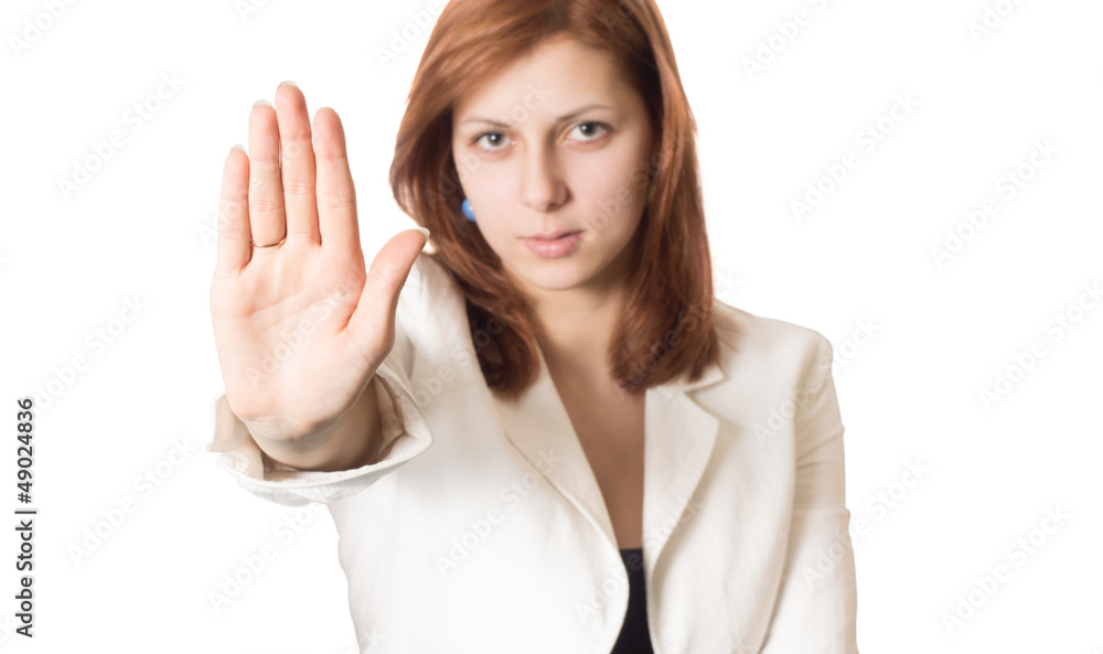 girl with golden hair shows banning hand gesture girl with golden hair shows banning hand gesture