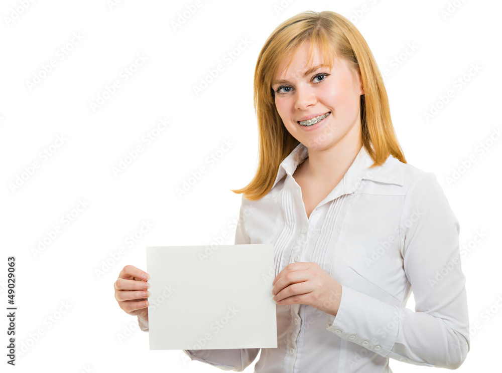 Young smiling woman with brackets and white billboard Young smiling woman with brackets and white billboard