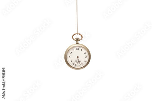 Old pocket clock isolated on white background