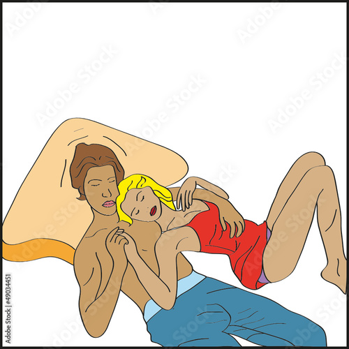 Loving couple lie on a bed