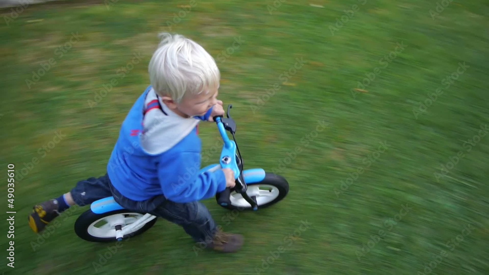child riding a bike child riding a bike