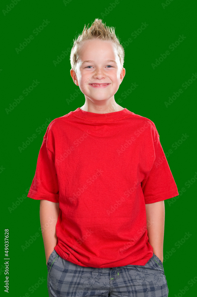 happy boy in front of green background happy boy in front of green background