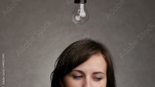 symbolic light bulb idea over head