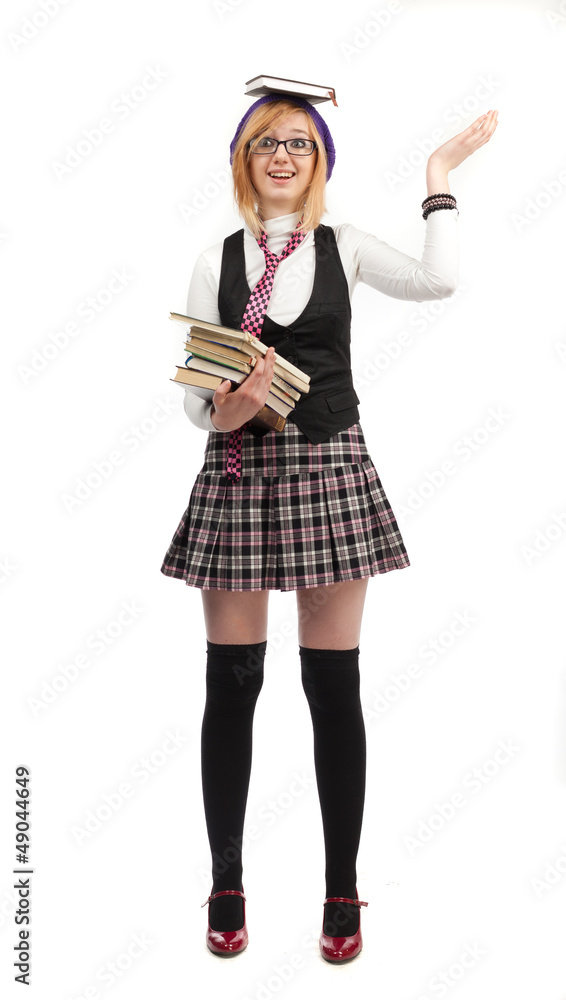 Girl with books standing on a white background Girl with books standing on a white background