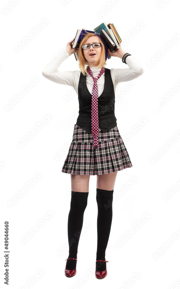 Girl with books standing on a white background Girl with books standing on a white background