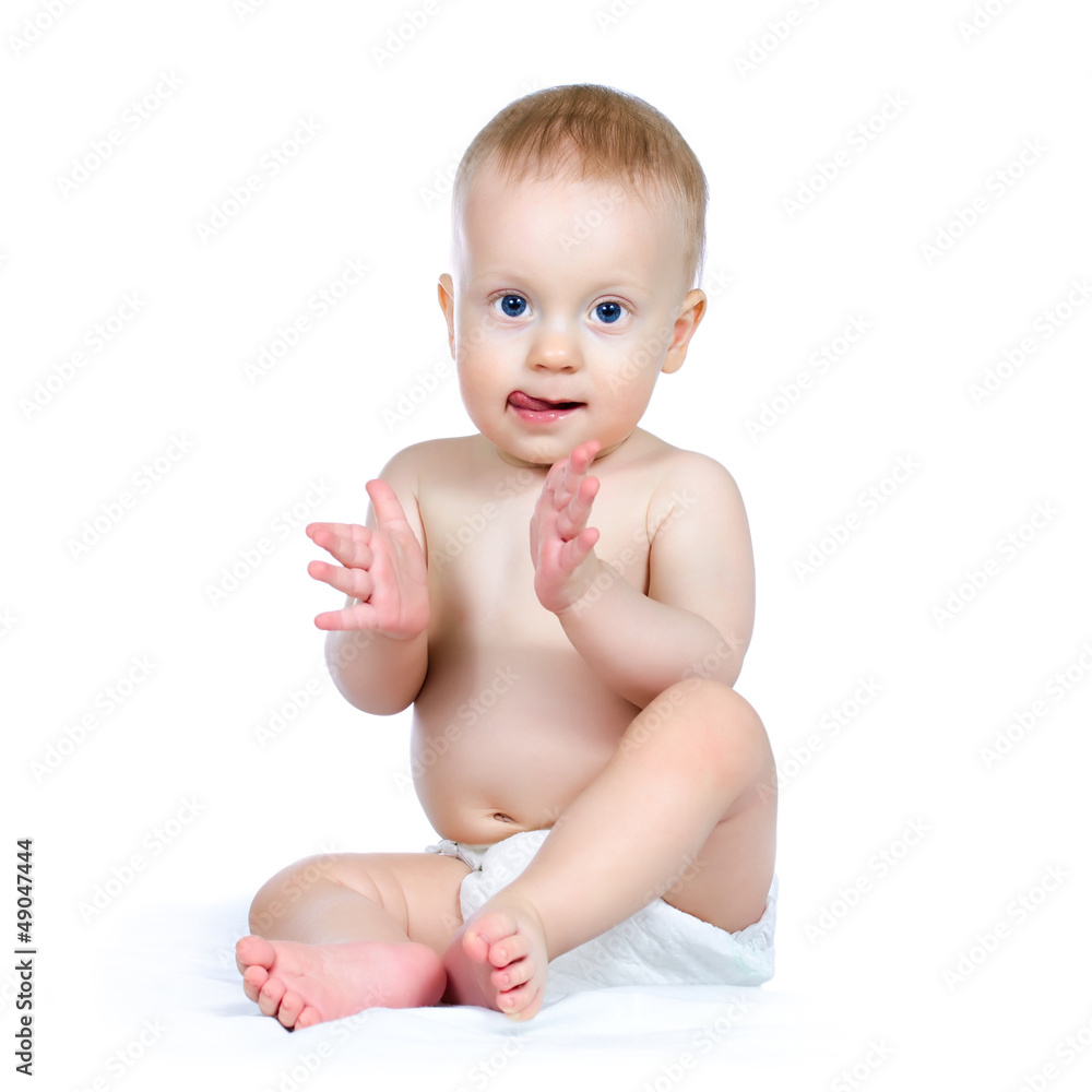 Nine month boy applauding, on white background. Nine month boy applauding, on white background.