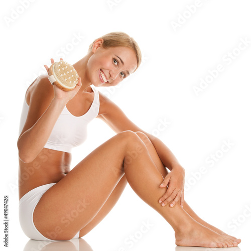 Woman with massage brush