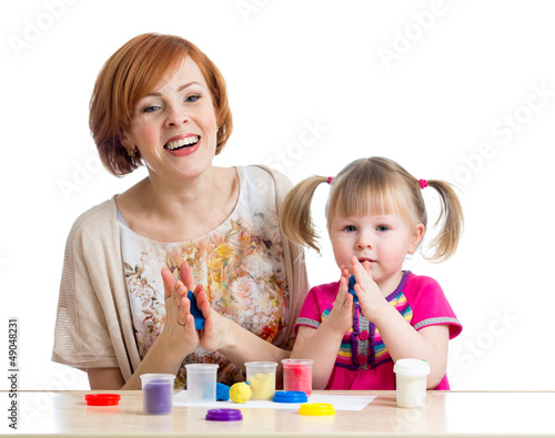 Happy child girl and mother...