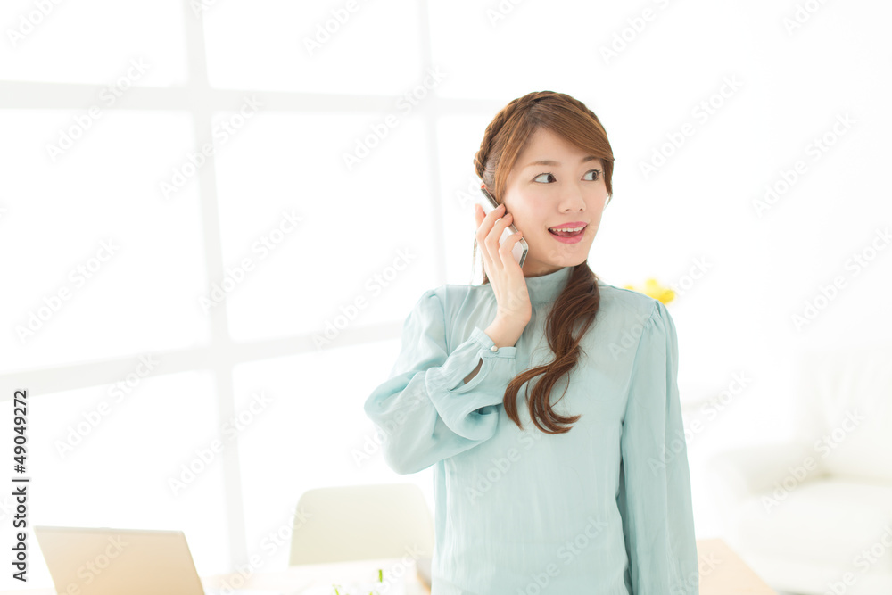 Beautiful young businesswoman working in office Beautiful young businesswoman working in office