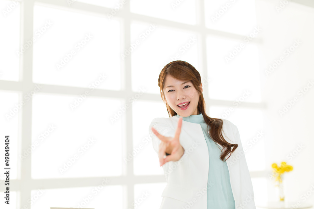 Beautiful young businesswoman working in office Beautiful young businesswoman working in office