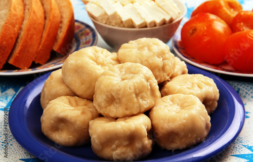 Pouches of dough with meat, khinkali.