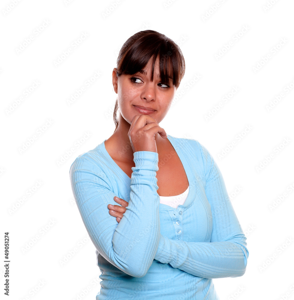 Pensive young woman with fringes on blue t-shirt Pensive young woman with fringes on blue t-shirt