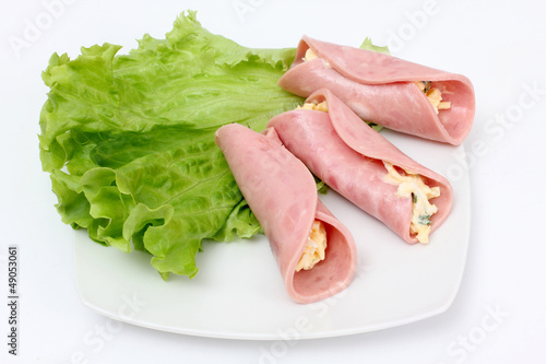 Sausage and salad on white plate