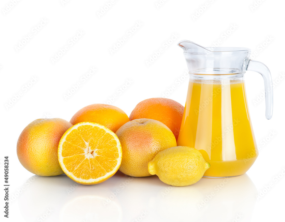 Jug of orange juice and citrus fruits isolated on white Jug of orange juice and citrus fruits isolated on white