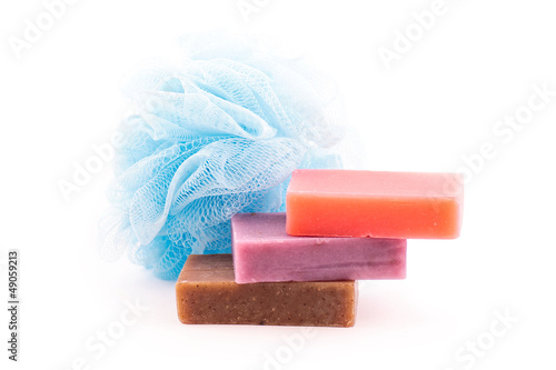 Bricks of handmade soap with sponge. SPA concept.