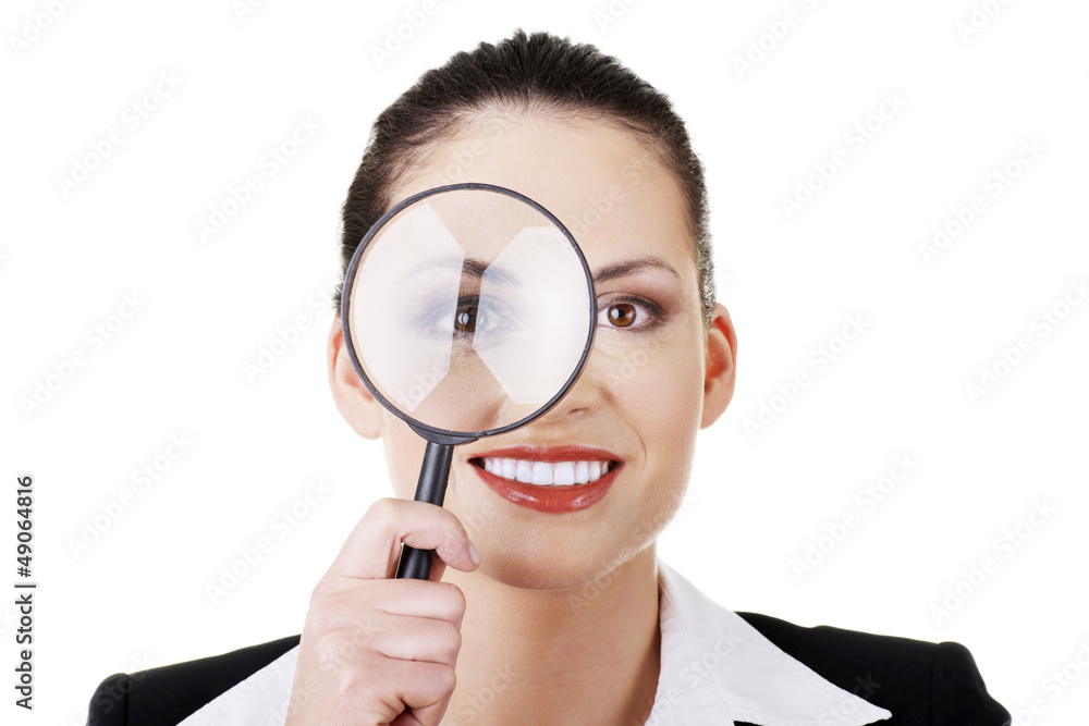 Businesswoman with magnifying glass Businesswoman with magnifying glass