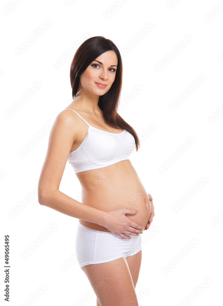 Pregnant woman with the beautiful belly over white background Pregnant woman with the beautiful belly over white background
