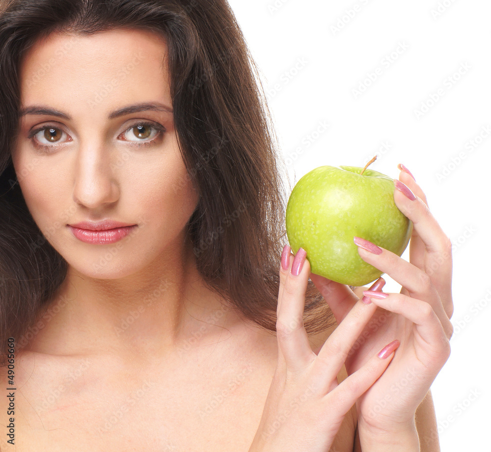 Portrait of a beautiful girl holding a fresh green apple Portrait of a beautiful girl holding a fresh green apple