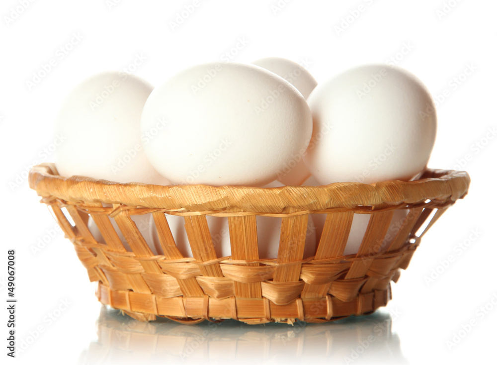 Many eggs in basket isolated on white Many eggs in basket isolated on white