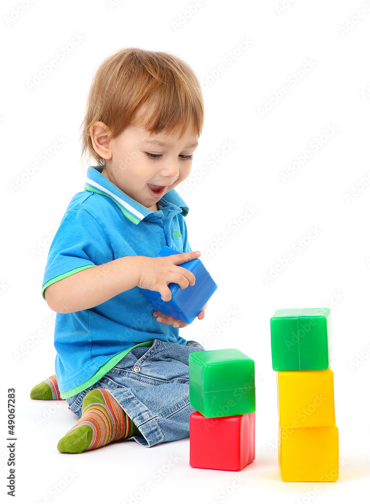 cute little boy with toy color cubes, isolated on white cute little boy with toy color cubes, isolated on white