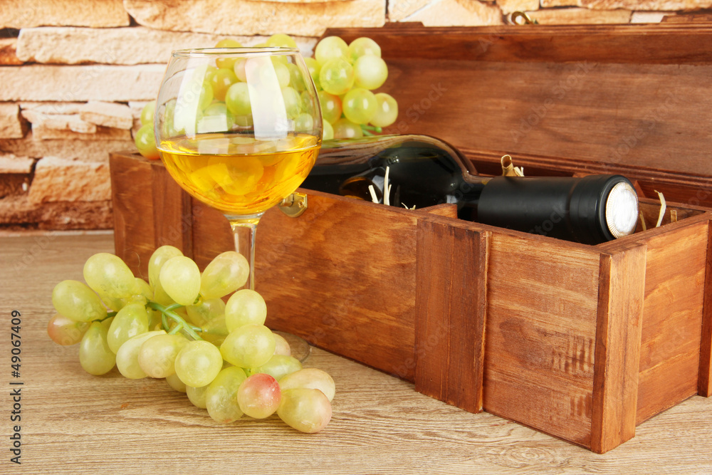 Obraz premium composition of wine,box and grapes