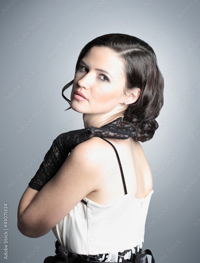 Fashion portrait of a young beautiful dark-haired Fashion portrait of a young beautiful dark-haired