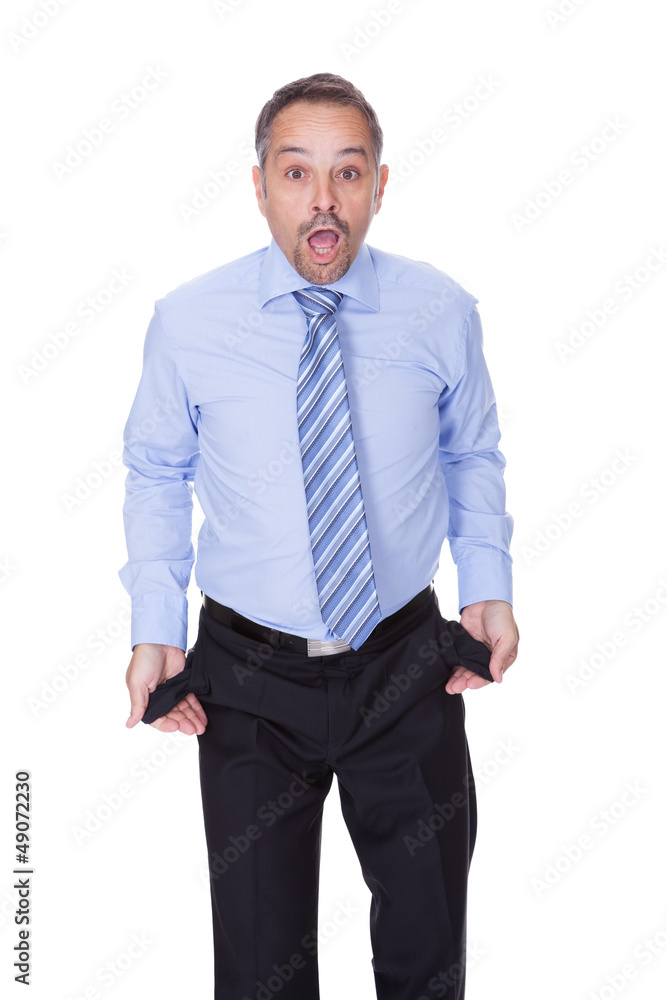 Businessman Showing Empty Pockets Businessman Showing Empty Pockets