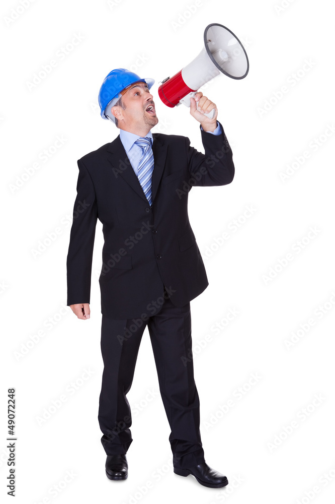 Male Architect Shouting In Megaphone Male Architect Shouting In Megaphone