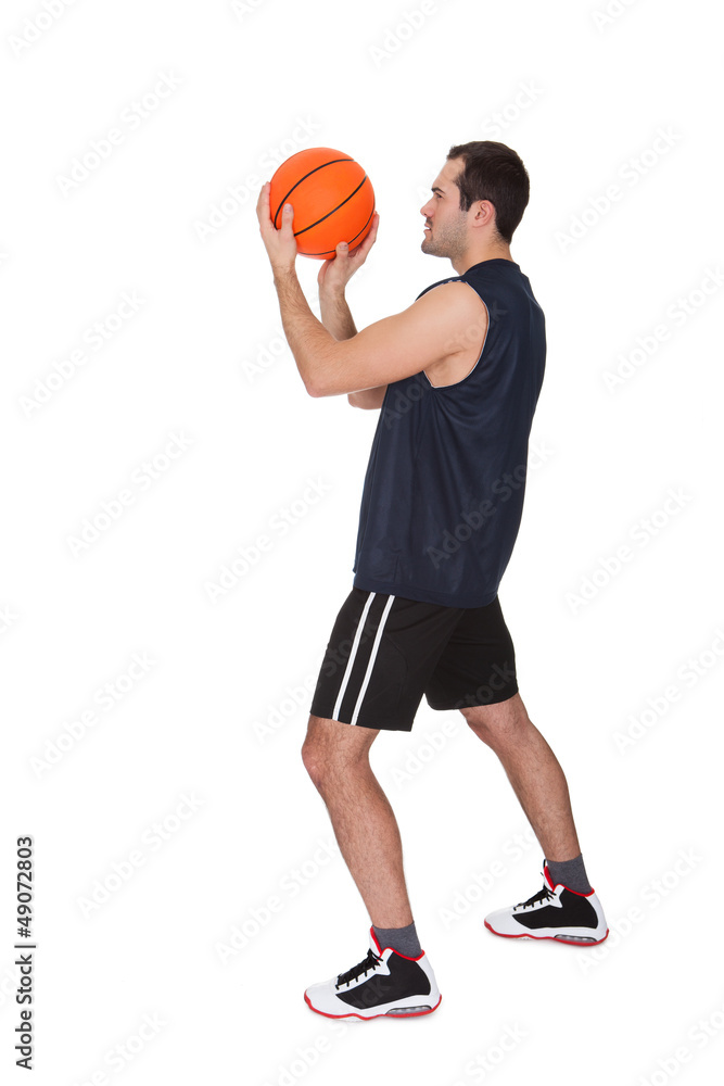 Professional basketball player throwing the ball