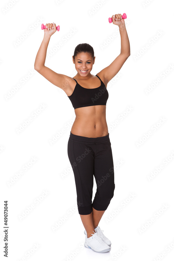 Happy Fitness Woman With Pink Dumbbells