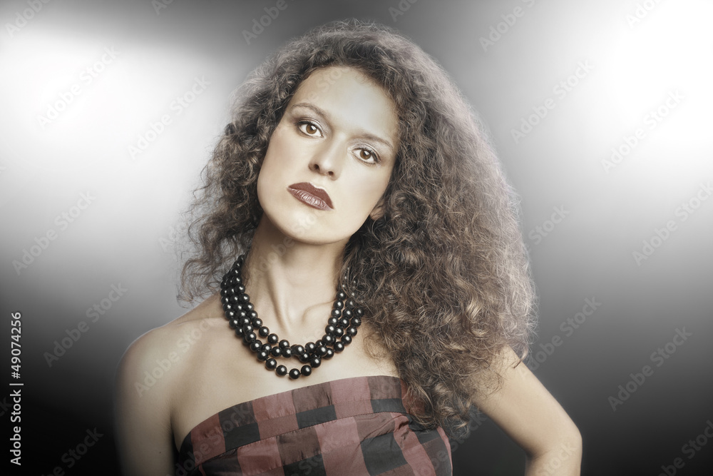 Fashion portrait curly woman brunette