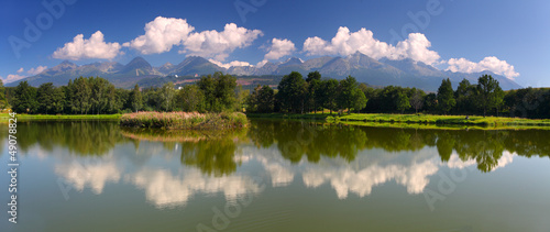 Tatra mountain with reflection in lake - panoramic view