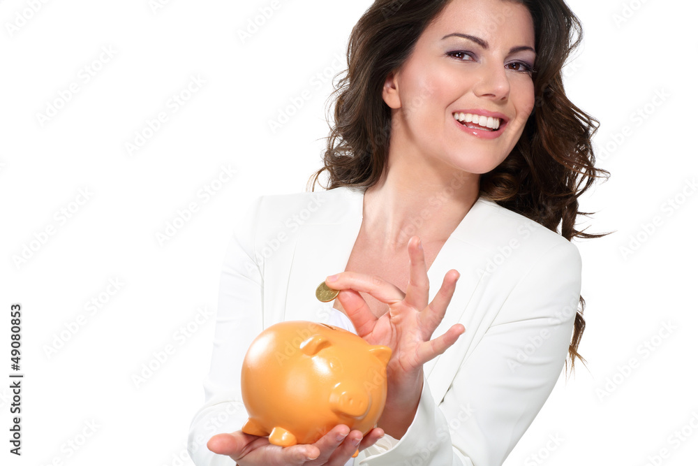 Young beautiful woman standing with piggy bank money box Young beautiful woman standing with piggy bank money box