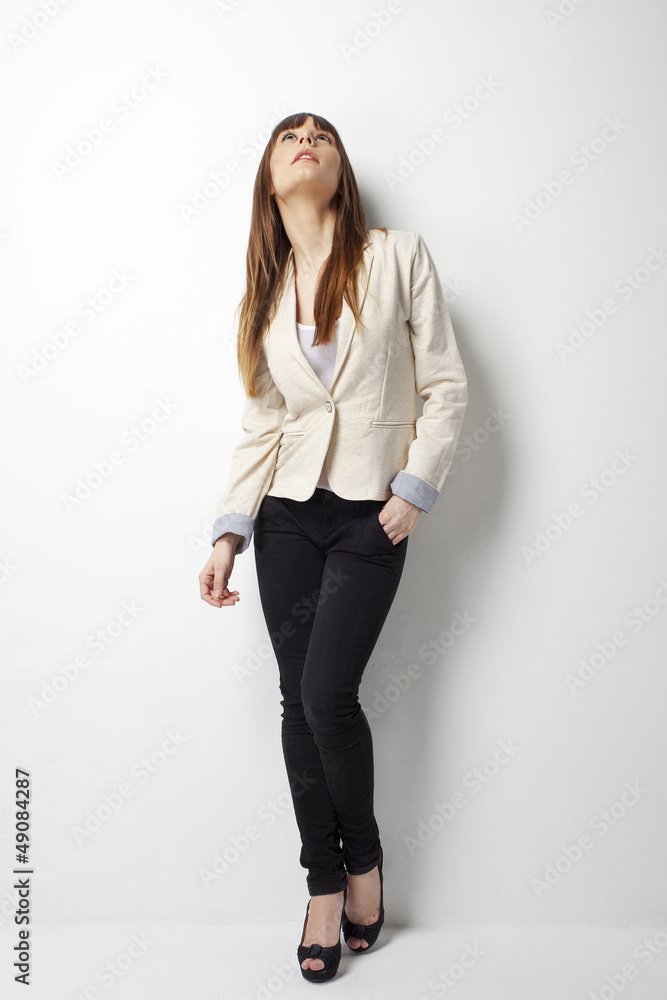 Young business woman looking up Young business woman looking up