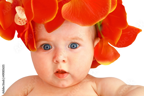 Cute baby girl with flowers