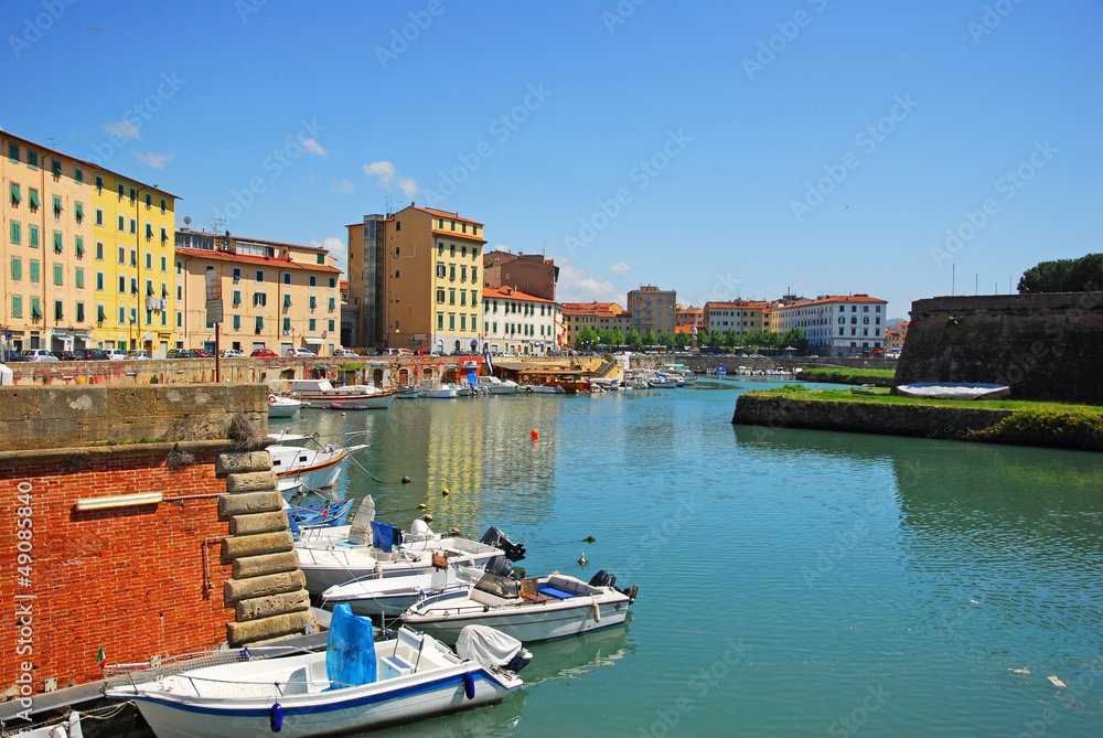 Italy, downtown Livorno, boats at Venice district