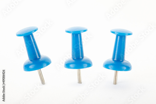 Blue pin collection on white, clipping path included