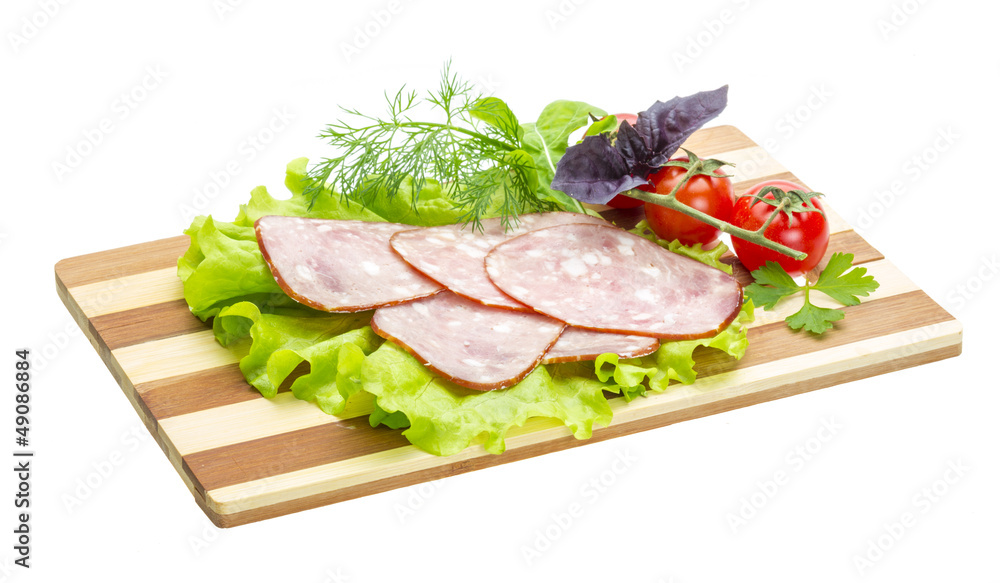 Sausages with salad and basil Sausages with salad and basil