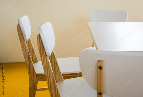 Wood chairs in the library room