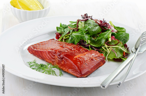 Smoked salmon filet with baby greens salad