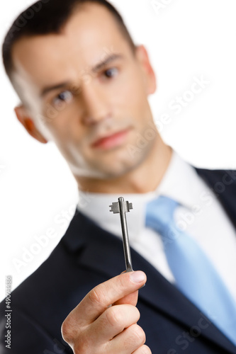 Manager shows key, isolated on white