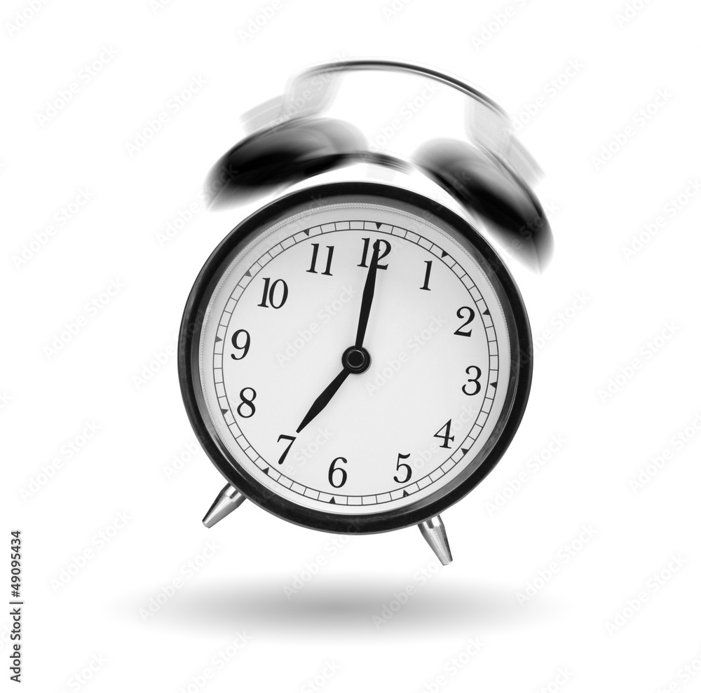 classical alarm clock ringing on white background classical alarm clock ringing on white background