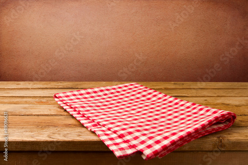 Retro background with wooden table and tablecloth