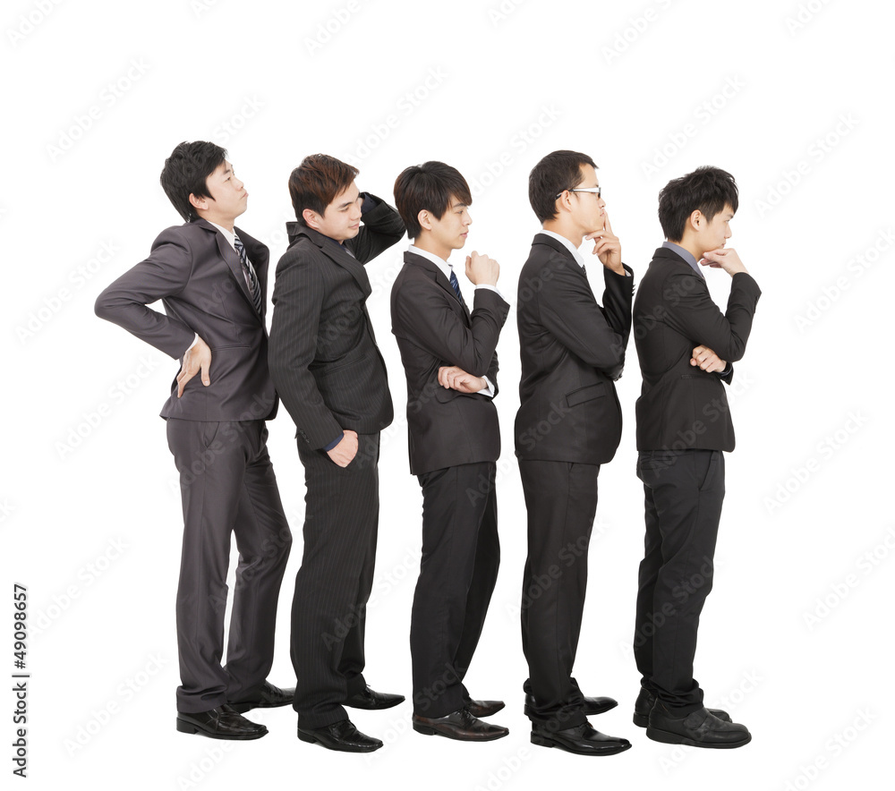Group of businessman standing in a line waiting Group of businessman standing in a line waiting
