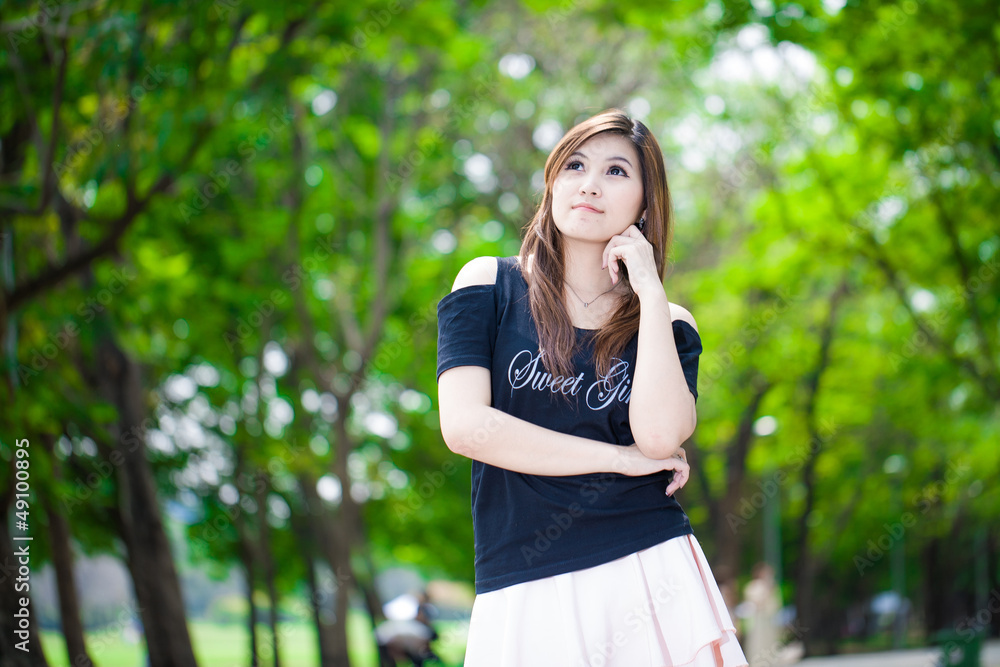Portrait of a sexy young female smiling in a park Portrait of a sexy young female smiling in a park